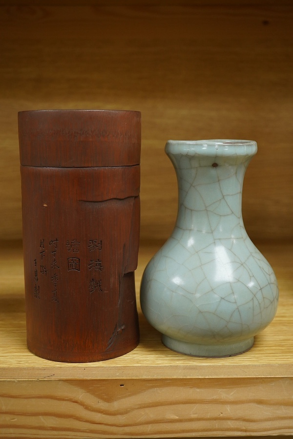 A Chinese bamboo tea cannister and crackleware vase bamboo canister, 17.5cm high. Condition - fair to good